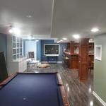 Engineered wood flooring and billiards area.