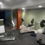 Exercise area with rubber tile floor.