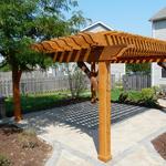 Free-standing cedar pergola with cedar toner.