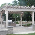 Naturally weathering cedar pergola.