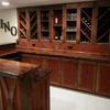 Back bar wine and glass storage, custom cabinets faced with barnwood